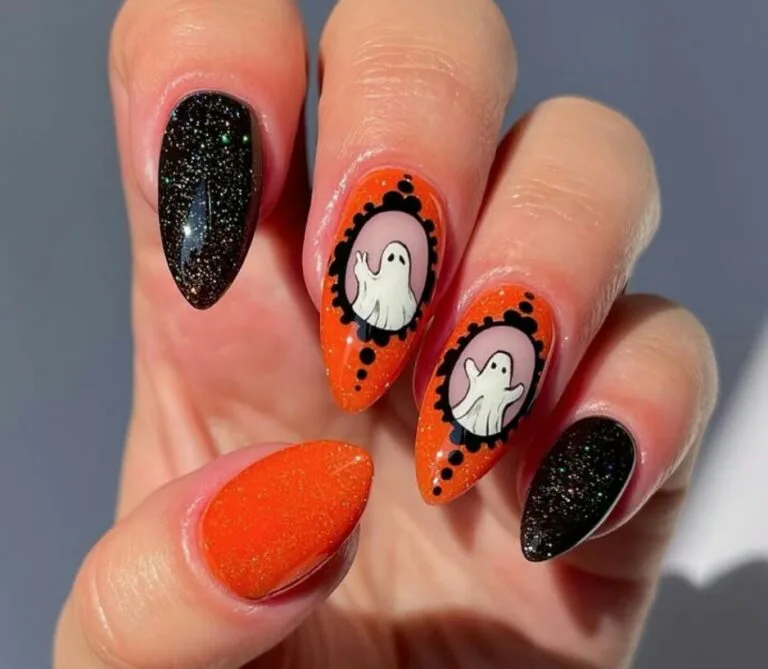 50+ Ways to Rock Black and Orange Halloween Nails this Year 1